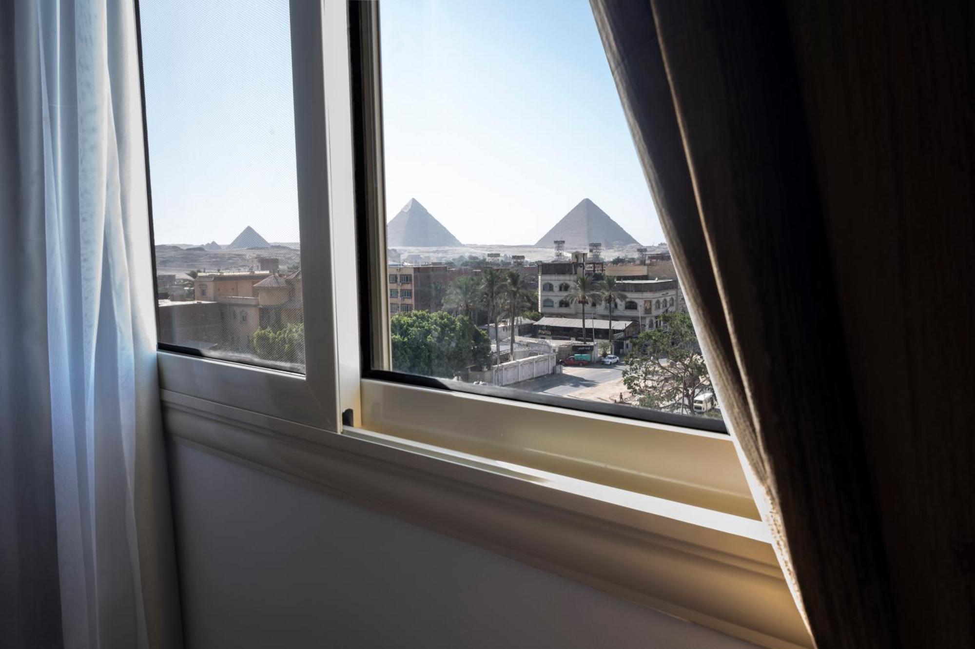 Palm Pyramids View Hotel Kafret el-Gabal Kamer foto
